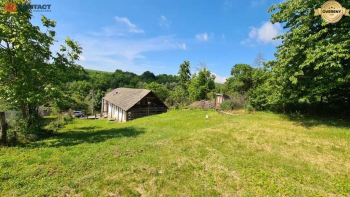 Reality Romantický pozemok s pôvodným domom v obci Hubina