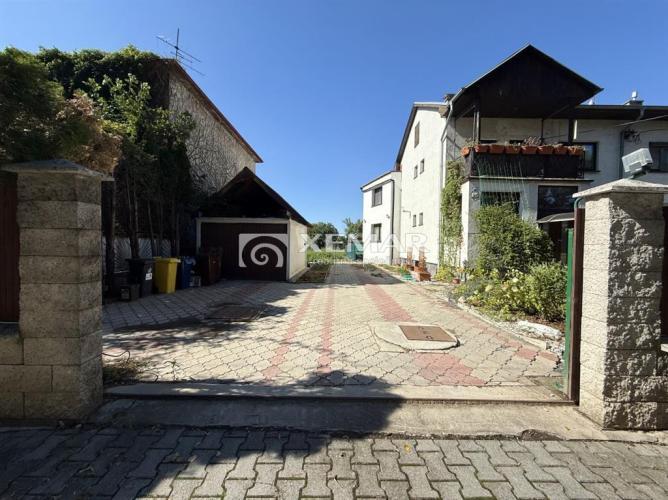 Reality Stavebný pozemok 1336m2 v Rusovciach - Kovácsová ul.