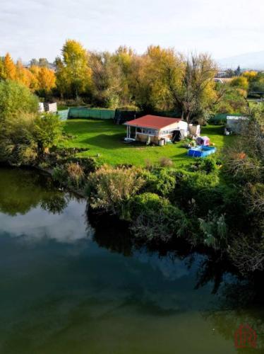 Reality KH-1018, PREDAJ Pozemok pri jazere 887 m², garáž, altánok