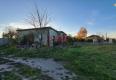 Reality Stav. pozemok 815 m2 s budovou - garážou, Levice, Kalinčiakovo, SM-878