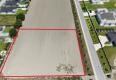 Reality Stavebný pozemok na predaj – Kvetoslavov, 2 500 m² - súkromná ulica