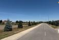 Reality Stavebný pozemok na predaj – Kvetoslavov, 2 500 m² - súkromná ulica